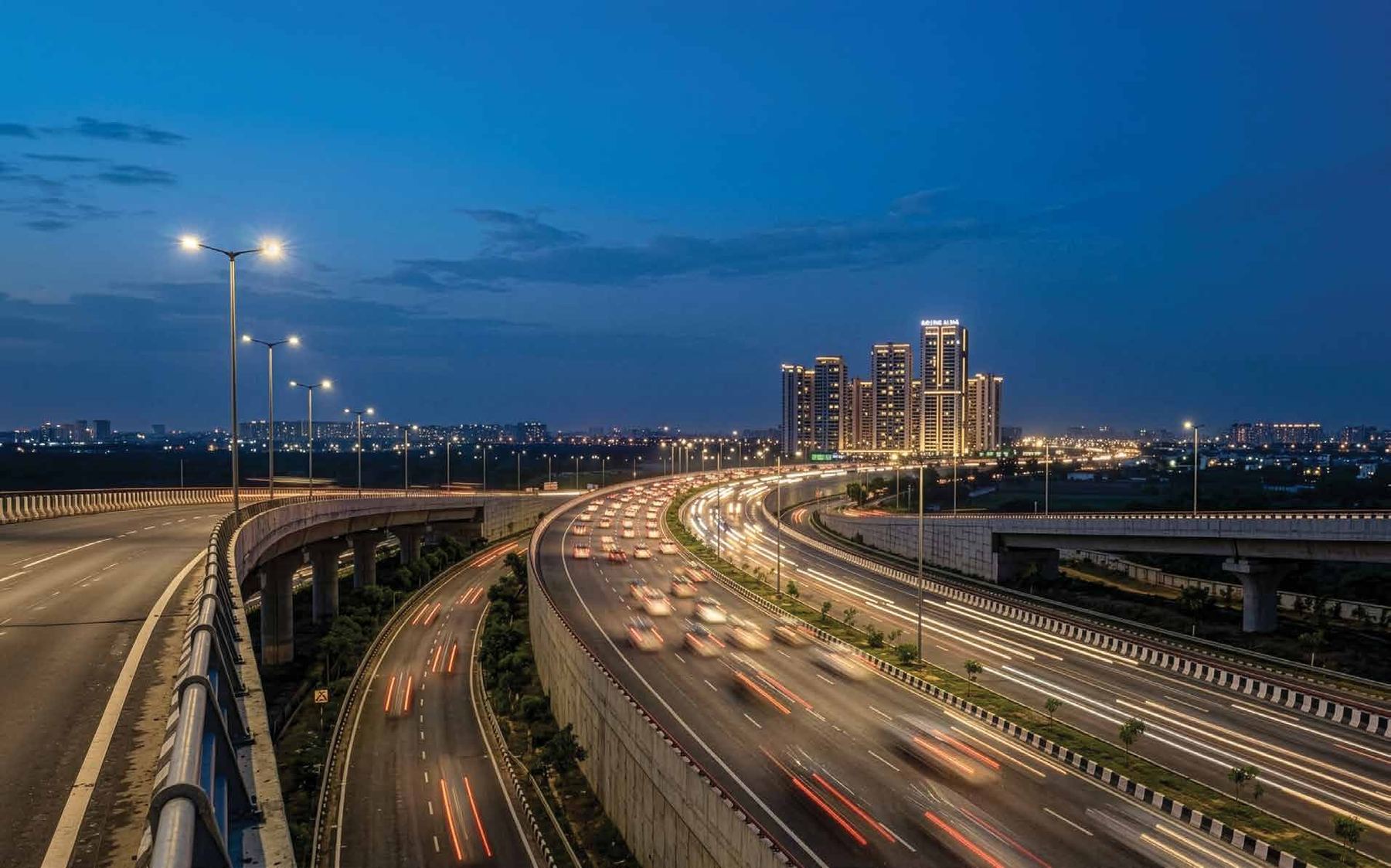 Long-exposure night photograph of the access-controlled expressway corridor near Bootes Aliva